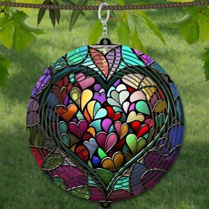 Beautiful Iridescent look Heart of Hearts Wind Spinner. Rugged & made to last